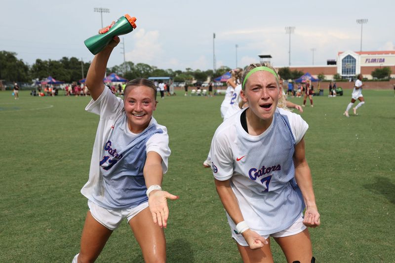 Florida Gators midfielder Sophia Sindelar and Florida Gators forward Zoe Main celebrate after the game against the Florida State Seminoles at the Donald R. Dizney Stadium at the University of Florida in Gainesville, FL on Sunday, August 23, 2026. [Matt Pendleton/Gainesville Sun]
