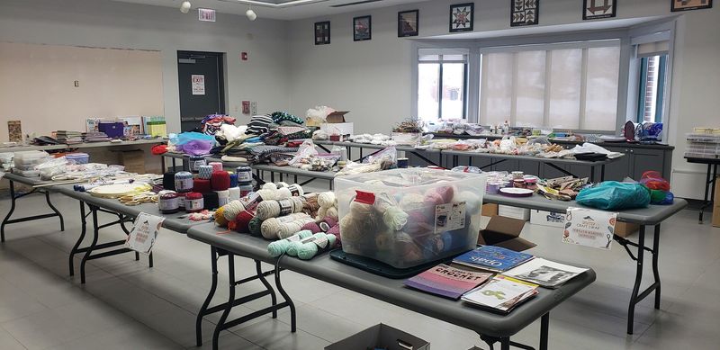 Tables are filled with donated craft items during a past craft swap at the Perry Public Library.