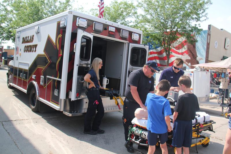 Dallas County EMS gives a demonstration during Public Safety Night at the Perry Farmers Market on Thursday, June 15, 2023.