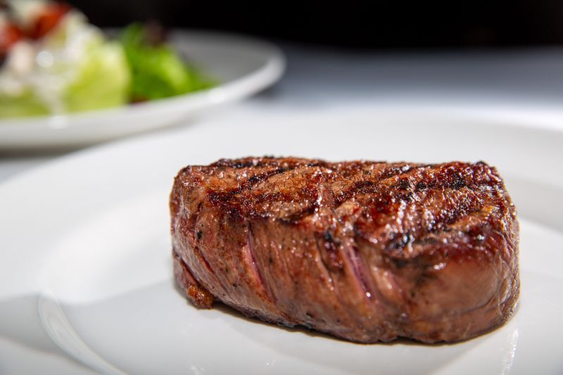 Steaks, such as this 8-ounce filet mignon, make up the heart of the 801 Chophouse menu.