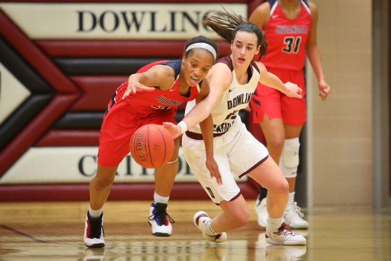 Urbandale senior Dee Dee Pryor and Dowling junior Caitlin Clark fight for the ball during a girlsÕ high school basketball game between the Urbandale J-Hawks and the Dowling Catholic Maroons at Dowling Catholic High School on Jan. 11, 2019 in West Des Moines, Iowa.