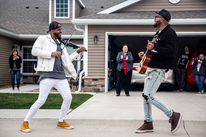 The B2wins perform a pop-up, drive way, Mother's Day concert for Karen Smith McNeese on Sunday, May 10, 2020 in Grimes.