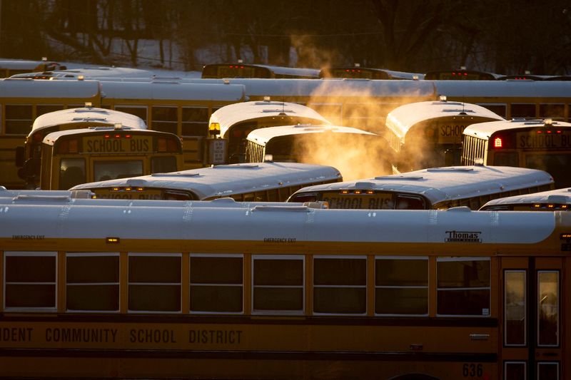Steam rises up over a school bus lot on Thursday, Feb. 13, 2020, in Des Moines. Temperatures Thursday morning dropped to minus 33 degrees with the windchill.