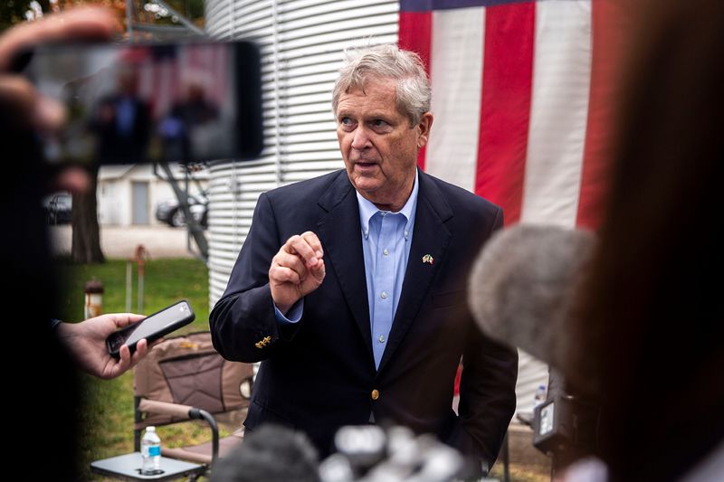 Tom Vilsack, then U.S. agriculture secretary, talks to reporters after touring an Iowa farm in 2021.