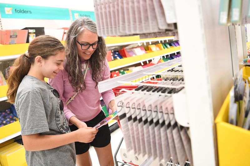 Josie Durrett, 10, shops for back to school supplies with her mom Courtney Durrett, during Tennessee’s annual sales tax holiday, at the Target on Washington Pike, Saturday, July 29, 2023. Courtney is a Knox County Commissioner.