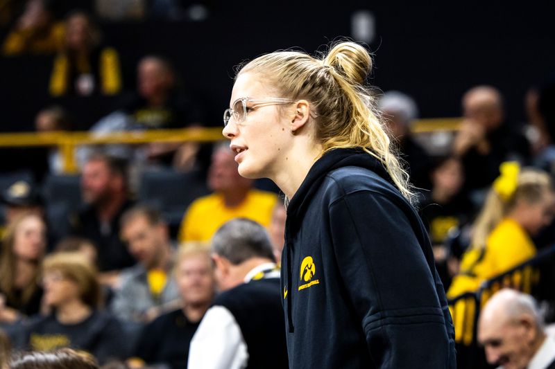 Iowa forward Ava Jones watches during a NCAA women's basketball exhibition game between Iowa and Clarke University, Sunday, Oct. 22, 2023, at Carver-Hawkeye Arena in Iowa City.