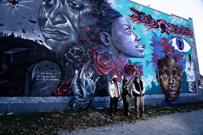 From left: Tim McCoy, Ivette Muhammad and Rep. Ako Abdul-Samad pose for a portrait outside Creative Visions on Thursday, November 2, 2023 in Des Moines.