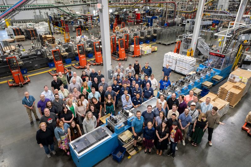Members of the Des Moines Register staff stand for a group photo at the south side production facility on May 23, 2024. The Des Moines Register celebrated its 175th anniversary on July 26, 2024. Its predecessor, the Iowa Star, was first published on July 26, 1849.