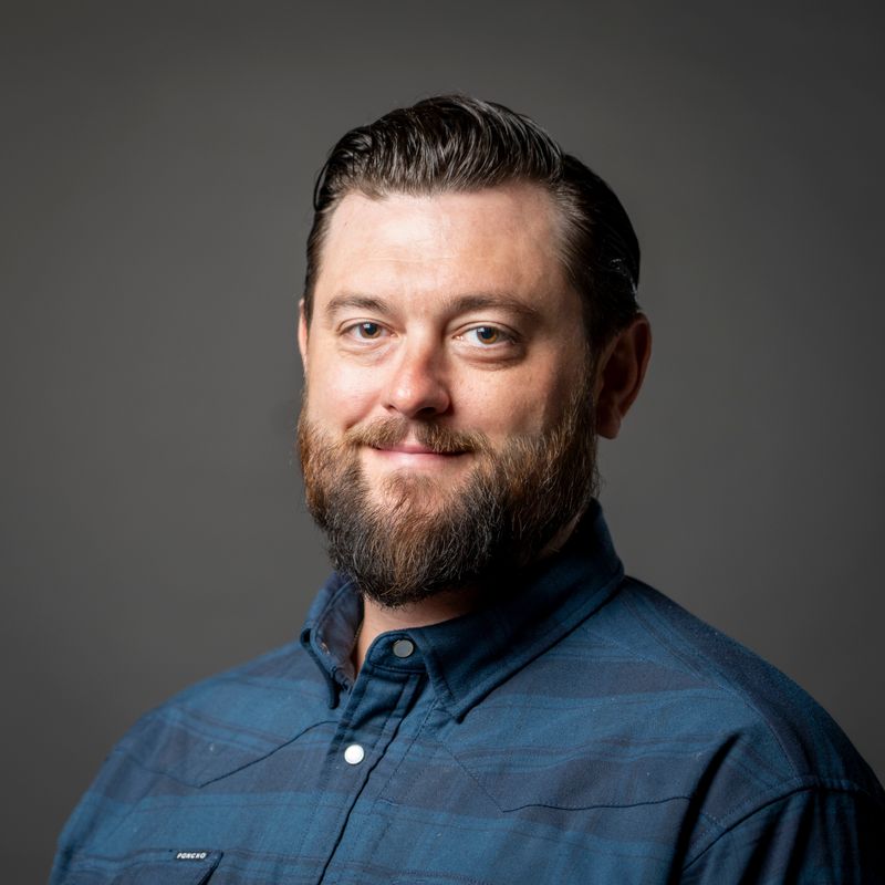 Travis Hines stands for a photo at the Des Moines Register, Thursday, July 11, 2024.