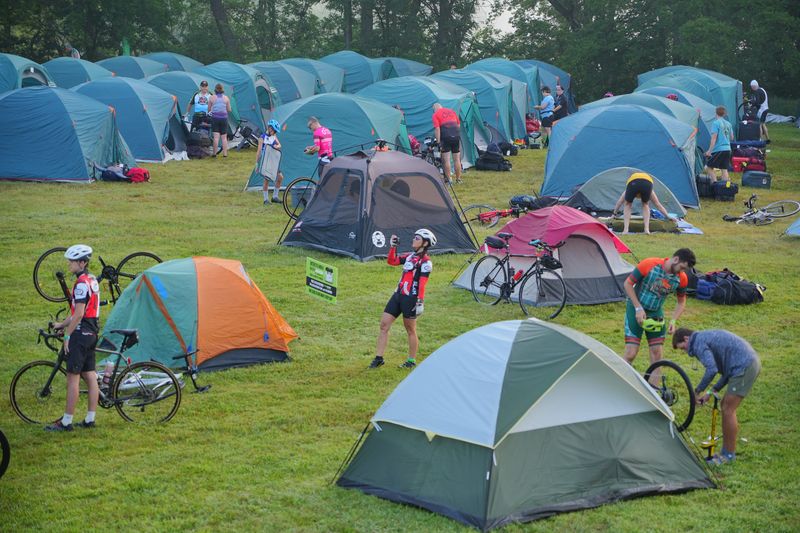 Riders pack up their campsites to begin RAGBRAI in Glenwood, Sunday, July 21, 2024.