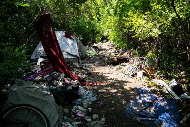 Several homeless camps like this one were seen in Des Moines Wednesday, July 31, 2024, as volunteers conducted a point-in-time survey of Polk County's unhoused population.