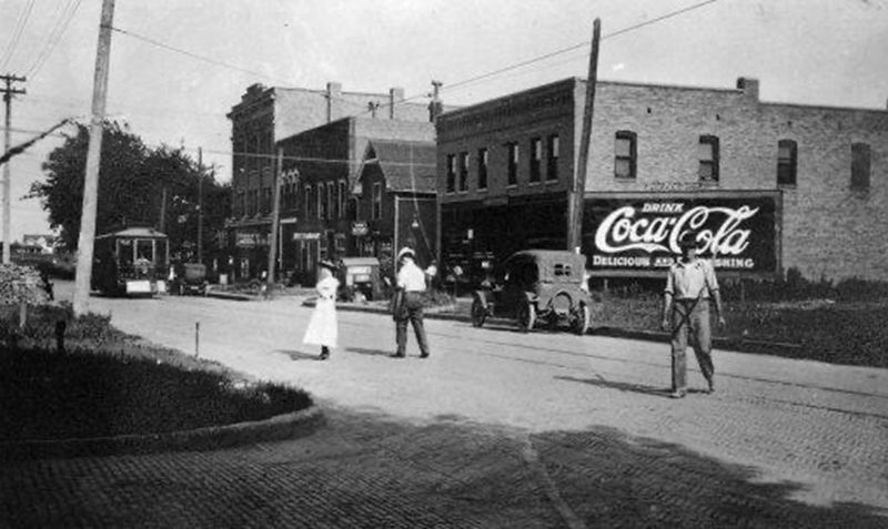 The College Commercial District at the southwest corner of 2nd Avenue and Euclid Avenue with the I.O.O.F. Hall building shown on the left. Picture was taken in approximately 1920.