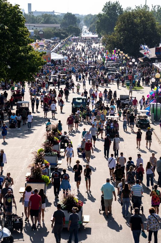 People move throughout the Iowa State Fairgrounds, as seen from the Sky Glider, during the Iowa State Fair on Thursday, Aug. 8, 2024 in Des Moines.