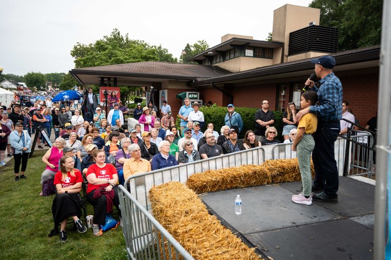 Democratic congressional candidate Lanon Baccam speaks during the Des Moines Register's Political Soapbox on Monday, Aug. 12, 2024, at the Iowa State Fairgrounds.