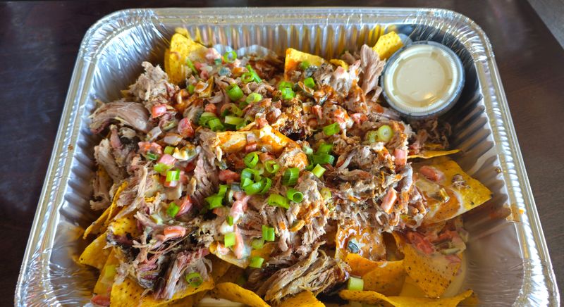 Up in Smoke nachos are on the menu at Whatcha Smokin' BBQ & Brew in Luther, Iowa. The restaurant has a stand at the Iowa State Fair in Des Moines for the second year.