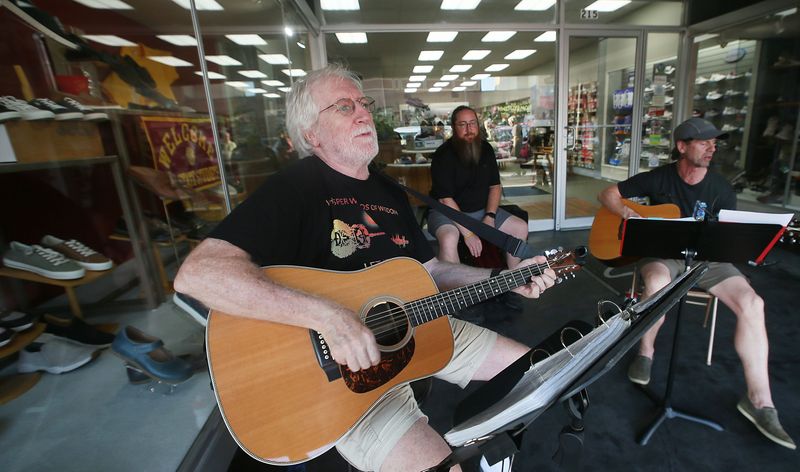 Red from Redz Bluez musical band performs at the annual Ames Music Walk in downtown on Main Street,Thursday, Sept. 19, 2024, in Ames, Iowa.