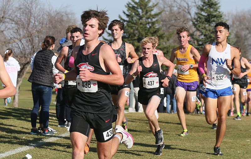 DCG’s Jack Meggison and Noah Kerndt run in the 4A high school boys cross Country at Lakeside Golf Course on Friday, Nov. 1, 2024, in Fort Dodge, Iowa.
