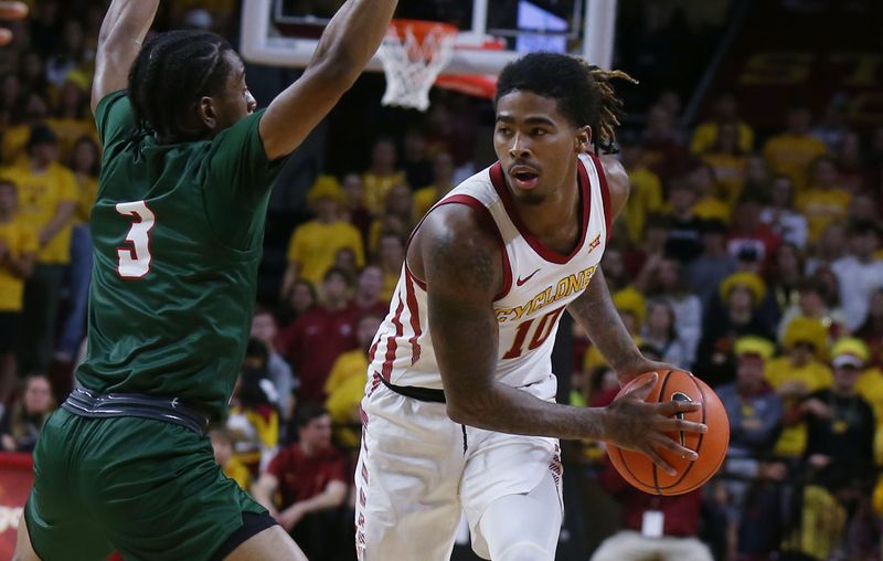Iowa State guard Keshon Gilbert (10) looks to drive around Mississippi Valley State Delta Devils' Donovan Sanders (3) at Hilton Coliseum on Monday, Nov. 4, 2024, in Ames, Iowa.