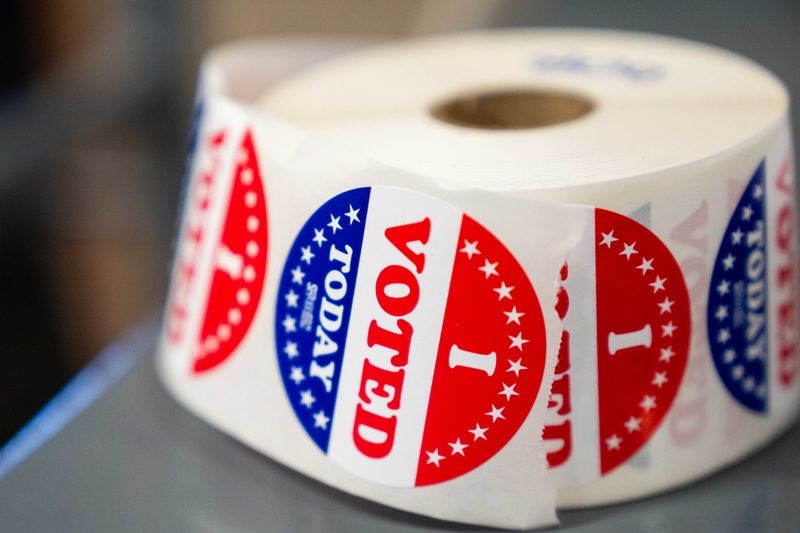 "I Voted" stickers rest on a vote tabulator on Election Day.
