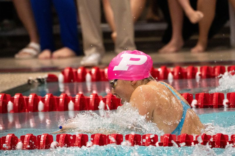 Perry's Aleah Karolus swims the 400-yard freestyle relay during the Iowa high school girls state swim meet at Marshalltown YMCA on Saturday, Nov. 16, 2024, in Marshalltown.
