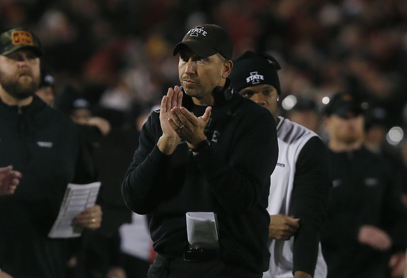 Iowa State Cyclones football head coach Matt Campbell reacts after a touchdown against Cincinnati during the first quarter in the week-12 NCAA football at Jack Trice Stadium on Saturday, Nov. 16, 2024, in Ames, Iowa.
