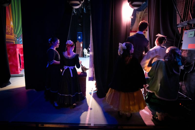 Dancers wait in the wings during a dress rehearsal of "The Nutcracker" by Ballet Des Moines, Tuesday, Dec. 10, 2024.