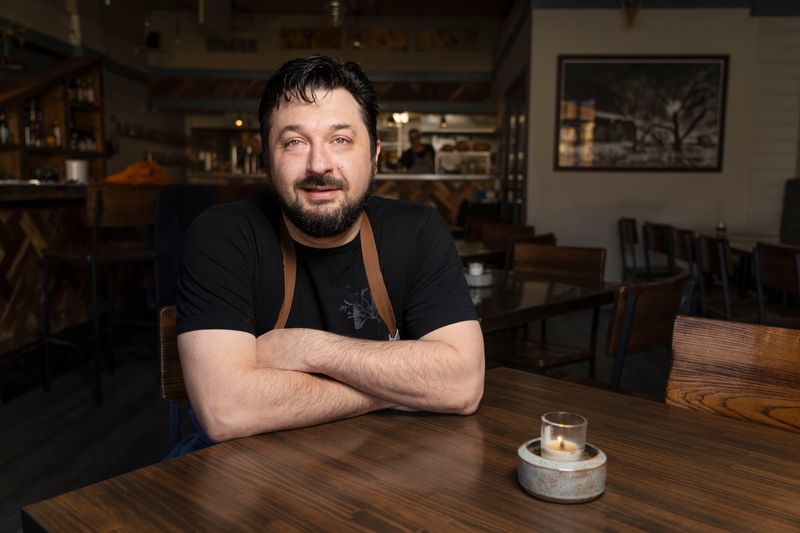 Owner and Chef Joe Tripp poses for a portrait at Harbinger on Tuesday, Jan. 28, 2025, in Des Moines.