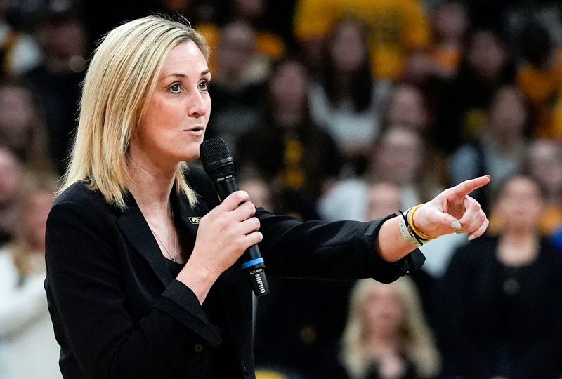 Iowa athletic director Beth Goetz speaks to the crowd during Caitlin Clark’s jersey retirement ceremony Sunday, Feb. 2, 2025 at Carver-Hawkeye Arena in Iowa City, Iowa.