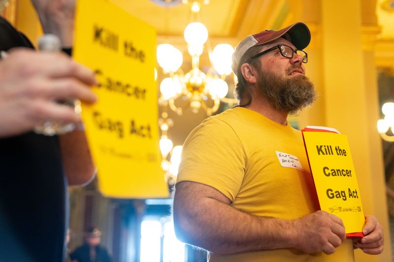 Nick Schutt joins fellow Iowans to call against the "Cancer Gag Act", SSB 1051, on Monday, Feb. 10, 2025, at the Iowa State Capitol.