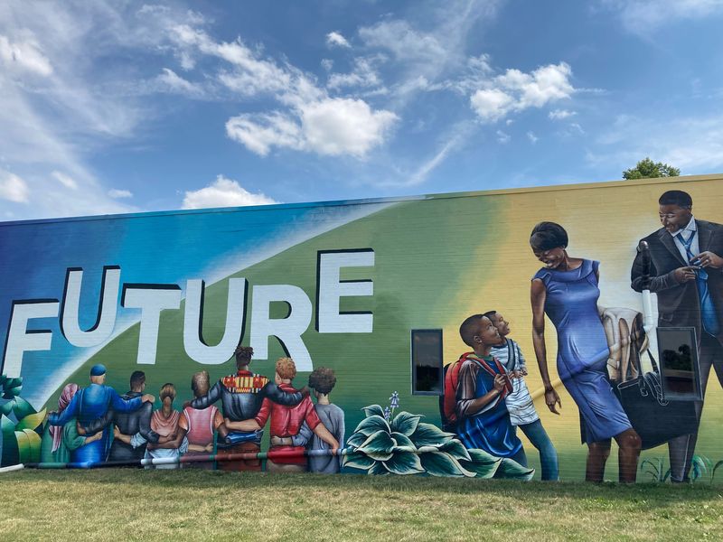 A segment of Jill Wells mural, "Future" located on the northside of the Evelyn K. Davis Center for Working Families.