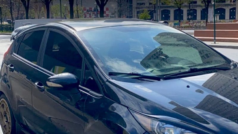 A tinted vehicle in downtown Detroit.