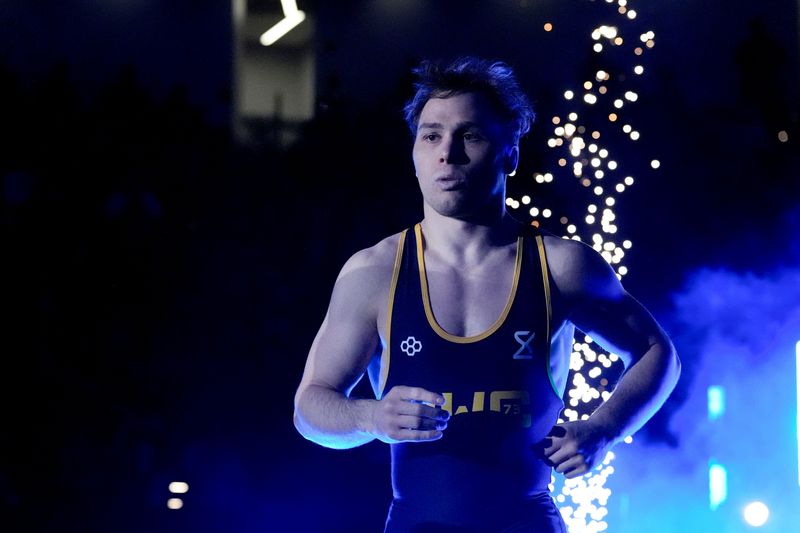 Spencer Lee in announced during an exhibition match against Masanosuke Ono at the “FloWrestling Night in America” event Wednesday, Feb. 26, 2025 at Xtream Arena in Coralville, Iowa.