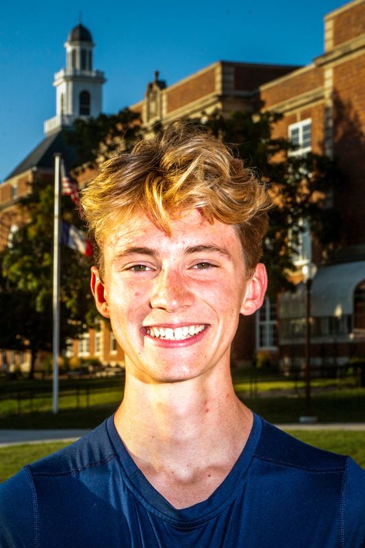 Iowa City High senior cross country runner Ford Washburn poses for a photo, Tuesday, Sept. 20, 2022, at City High School in Iowa City, Iowa.