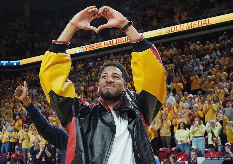 Former Iowa State and Indiana Pacers guard Tyrese Haliburton shows heart sign as the unveiling his Olympic 24 gold made banner during the halftime of Cyclones and Wildcats men’s basketball showdown at Hilton Coliseum on Saturday March 1, 2025 in Ames, Iowa.