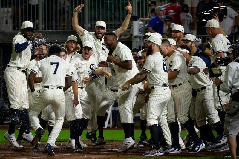 The Chicago White Sox’s Tim Anderson (7) hits a two-run walk-off home run in the bottom of the ninth inning to give the White Sox a 9-8 victory over the New York Yankees at the Field of Dreams movie site on Thursday, Aug. 12, 2021 in Dyersville, Iowa.