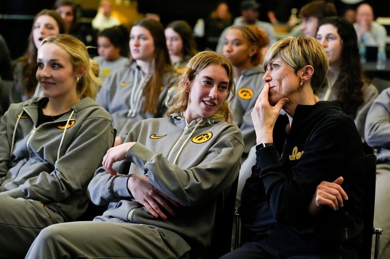 Iowa Lucy Olsen and Head Coach Jan Jensen talk during a watch party for the the NCAA Womenâ€™s Basketball Tournament bracket reveal Sunday, March 16, 2025 at Carver-Hawkeye Arena in Iowa City, Iowa.