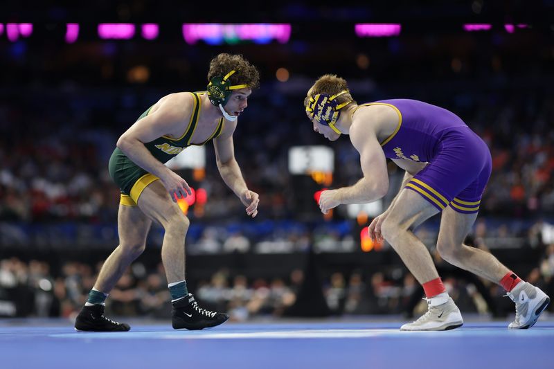 Mar 20, 2025; Philadelphia, PA, USA; Trever Anderson of University of Northern Iowa wrestles Tristian Daugherty during day one of the NCAA Wrestling championships at Wells Fargo Center. Mandatory Credit: Bill Streicher-Imagn Images