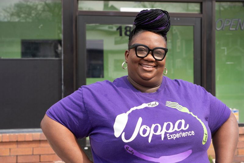 Christine Johnson stands for a portrait outside her restaurant Joppa Experience on Wednesday, April 2, 2025, in Des Moines.