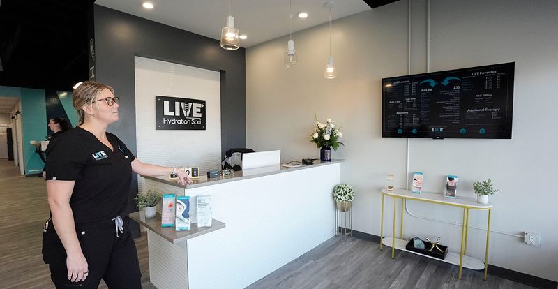 Marci Smith, co-owner of Live Hydration Spa , gives a tour at the spa on Lincoln Center, Thursday, April 1, 2025, in Ames, Iowa.