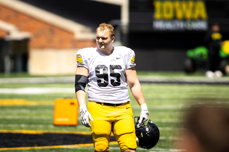 Apr 26, 2025; Iowa City, IA, USA; Iowa defensive lineman Aaron Graves (95) looks on during a spring NCAA football open practice at Kinnick Stadium. Mandatory Credit: Joseph Cress/For the Register