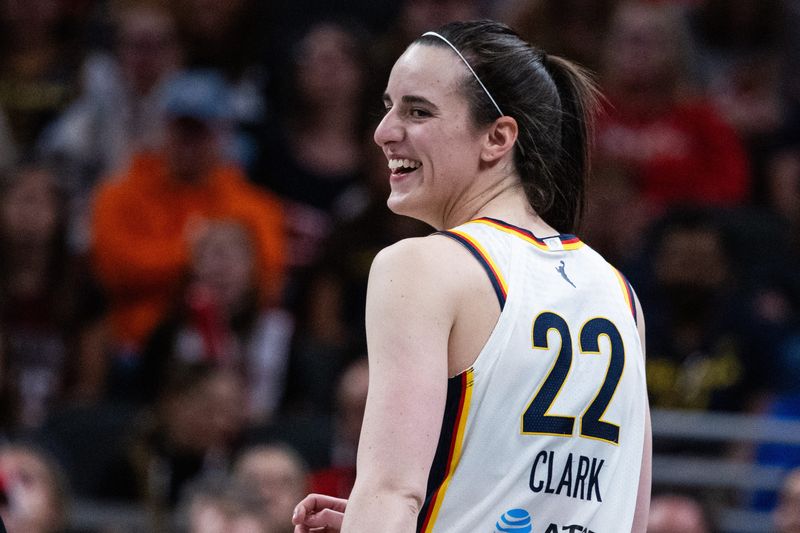 May 24, 2025; Indianapolis, Indiana, USA; Indiana Fever guard Caitlin Clark (22) in the first half against the New York Liberty at Gainbridge Fieldhouse. Mandatory Credit: Trevor Ruszkowski-Imagn Images
