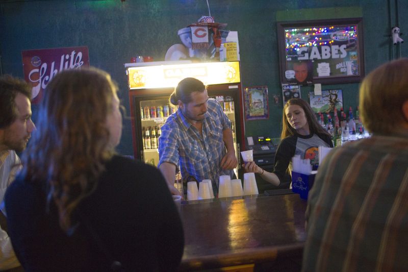 Seth Goodman serves drinks at Gabe's on Monday, Oct. 13, 2014.