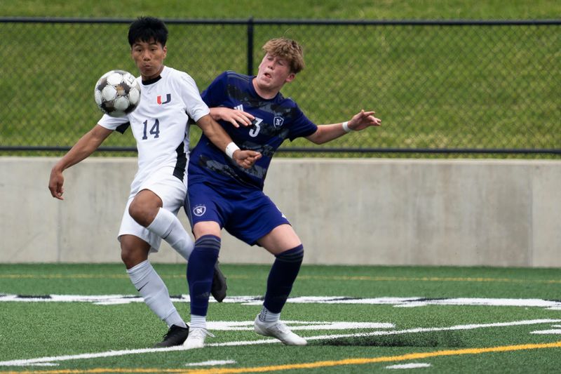 Urbandale's Chris Boina and Norwalk's Nolan Fletcher battle for the bal during the 2025 Iowa high school boys state soccer tournament at Mediacom Stadium on June 5, 2025, in Des Moines.