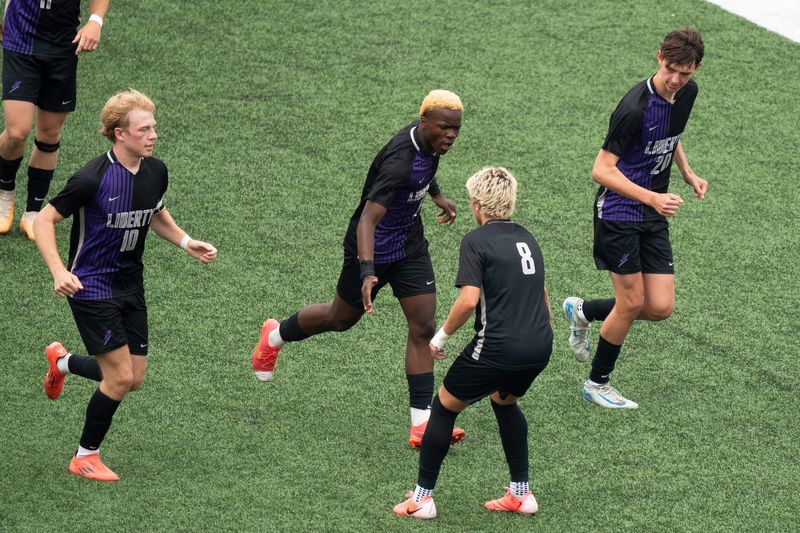 Iowa City Liberty players celebrate a goal during the 2025 Iowa high school boys state soccer tournament at Mediacom Stadium on June 5, 2025, in Des Moines.