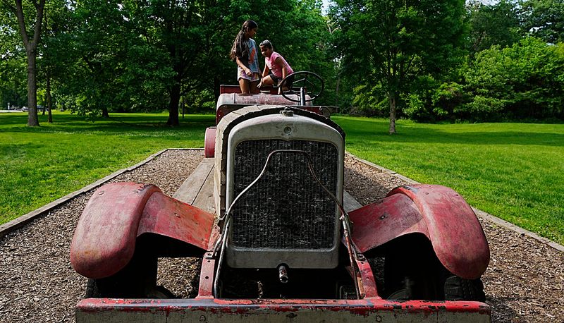 Children play on the famous fire truck at Brookside Park on June 4, 2025, in Ames, Iowa
