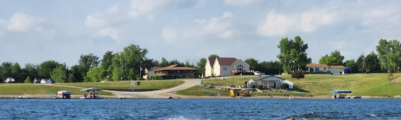 A view of the dam, beach and beach house at Sun Valley Lake in southwestern Iowa.
