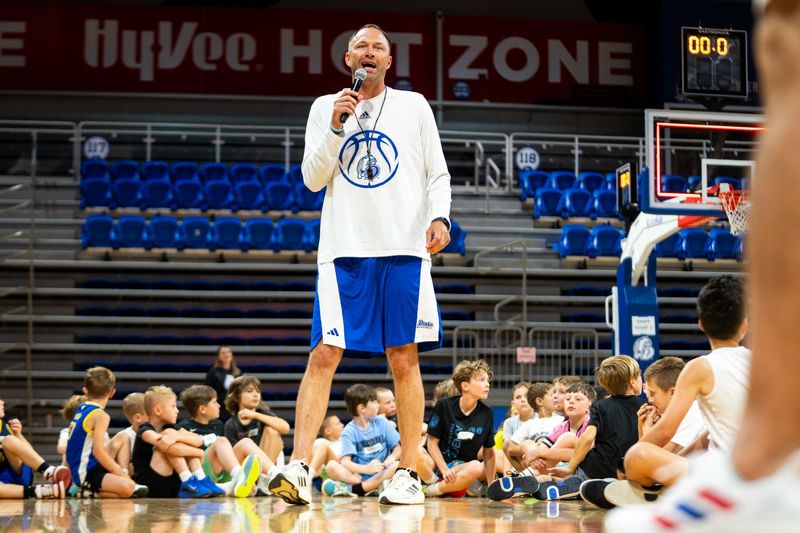Drake head coach Eric Henderson speaks to participants at Drake's basketball camp on June 9, 2025, at the Knapp Center in Des Moines.
