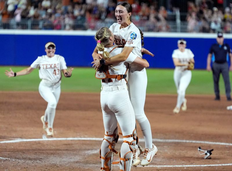 Texas's Teagan Kavan, right, celebrates following the Women's College World Series championship game between Texas Tech and Texas at Devon Park, Friday, June, 6, 2025, in Oklahoma City.