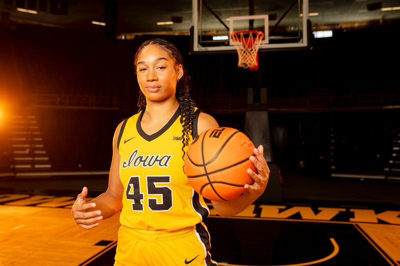 Hannah Stuelke stands for a photo during Iowa Womenâ€™s Basketball media day at Carver Hawkeye Arena in Iowa City, Thursday, Oct. 10, 2024.