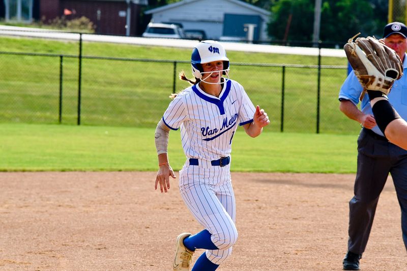 Van Meter's Finley Netten runs the bases against Panorama on June 12, 2025.